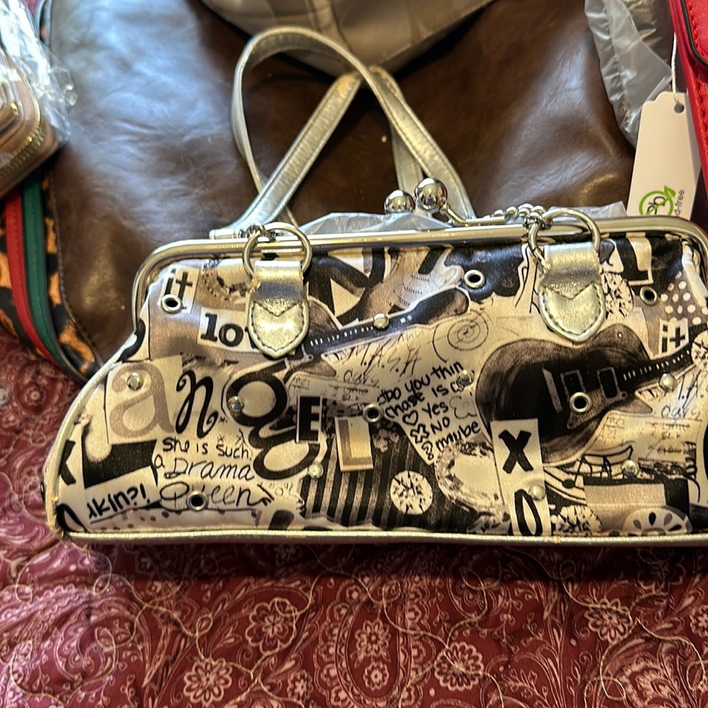 Small silver and black bag